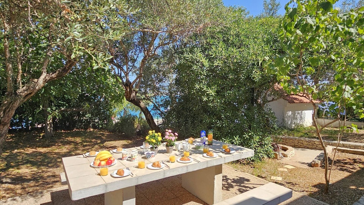 Mastrinka Villa | Sea Front Stone Villa, just 5m from pebble beach, 3km from Trogir Old Town