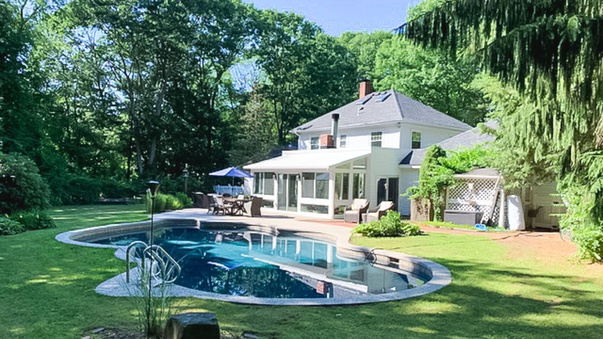 Hampton Falls House | Seacoast home with private pool, sunroom, patio, grill, firepit, & fireplace