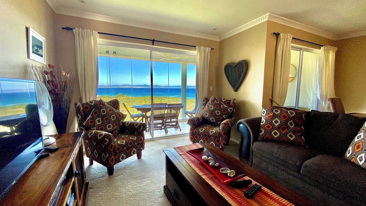 Hermanus City-Centre Apartment | Seafront @ Marine Terrace - views of Walker Bay. Whales, waves and sunrise
