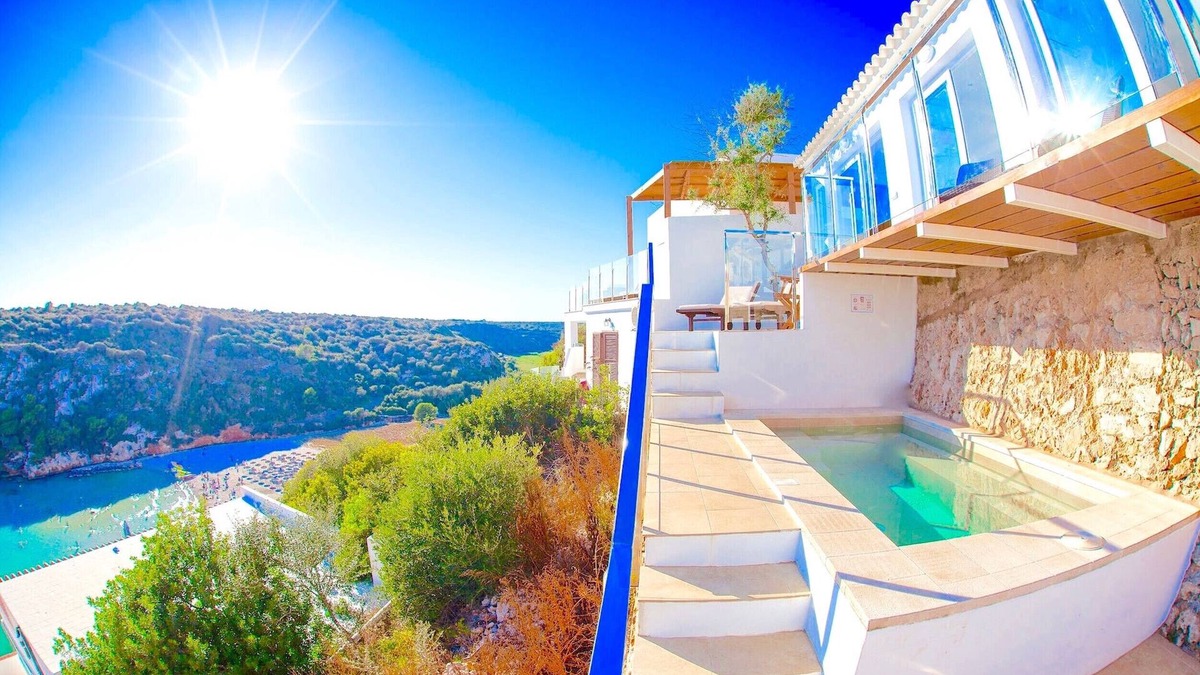 Cala en Porter Villa | Seafront Villa Bellavista with private heated pool