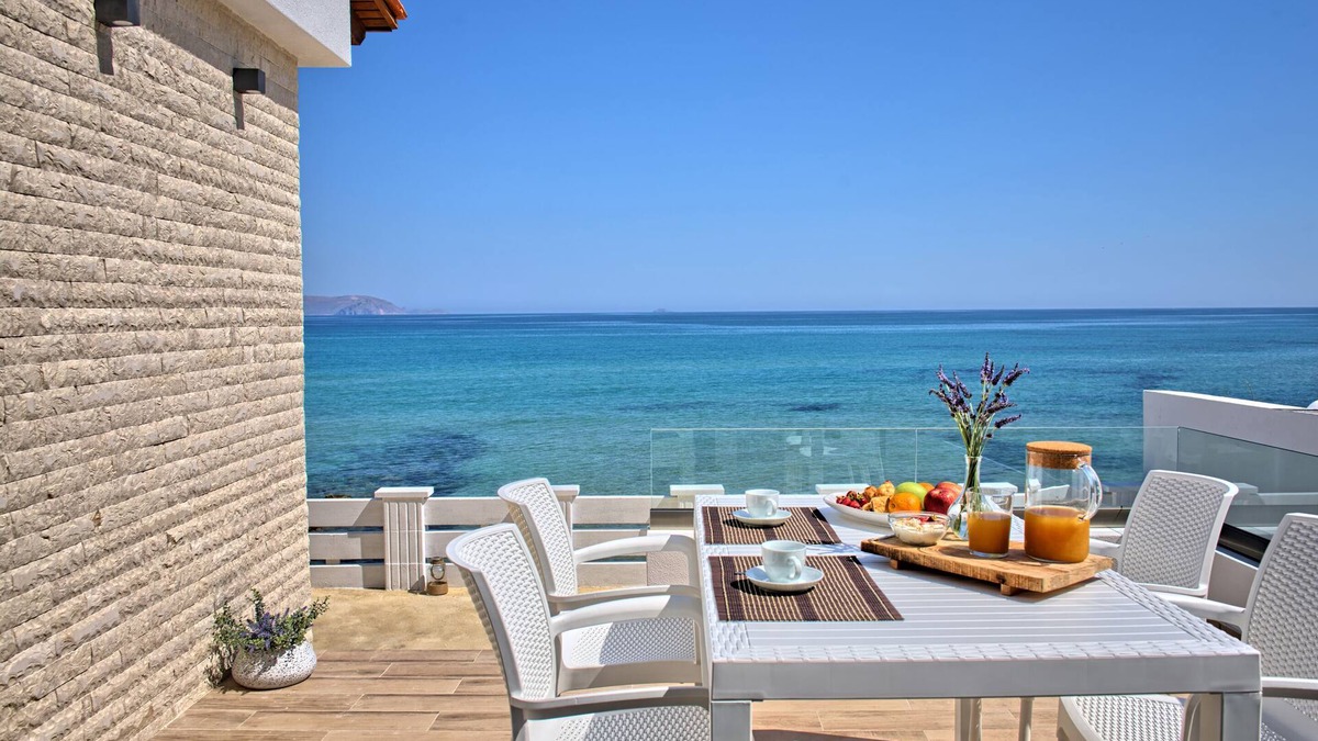 Kokkini Chani Villa | Seashell, an Elegant Seafront Villa by Nirousuites