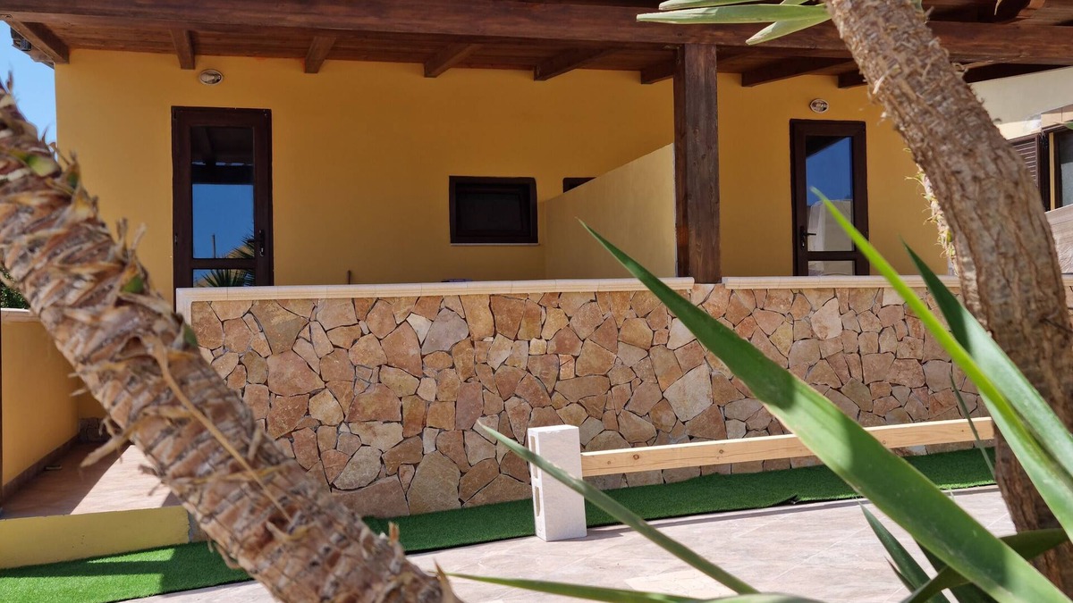 Lampedusa Condo | Seaside apartment with barbecue and outdoor furniture