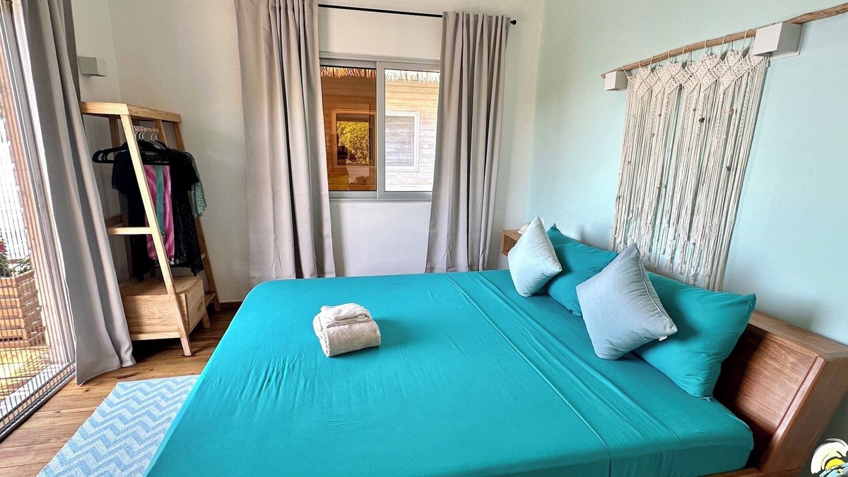 Isla Solarte House | Seaside Dream Over Water Bungalow, Bedroom, King Bed, Living Room, Kitchenette
