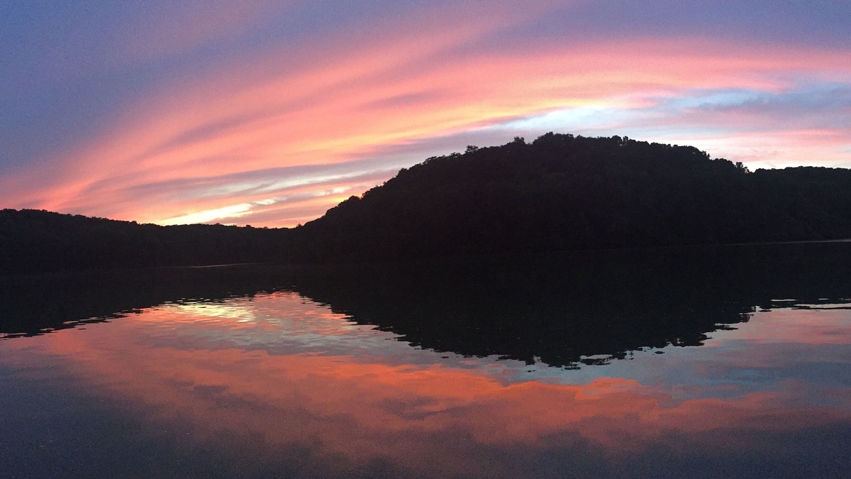 Glouster House | Secluded 5 BR brick ranch with a panoramic view of the lake through the trees