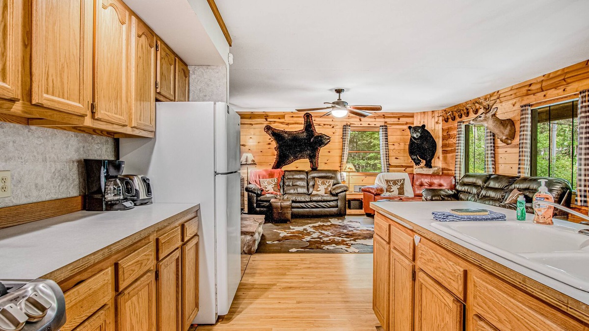 Lac du Flambeau House | Secluded dog-friendly home with dock, woodstove, porch, firepit, kayaks, & bikes