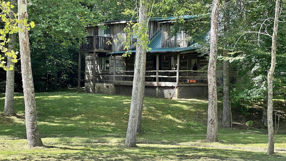 Stanton Cabin | Secluded Large Group Authentic Cabin with fishing, a hot tub and wi-fi