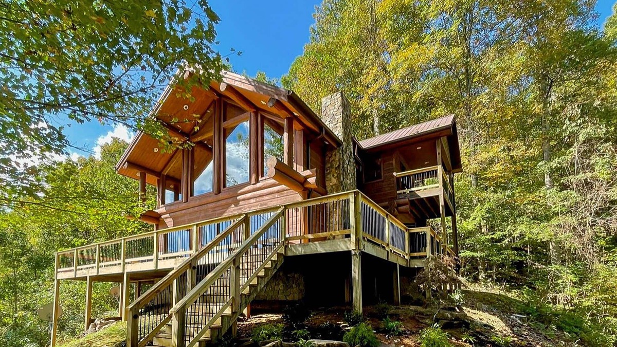 Almond Cabin | Secluded log cabin with fireplace and hot tub on deck.