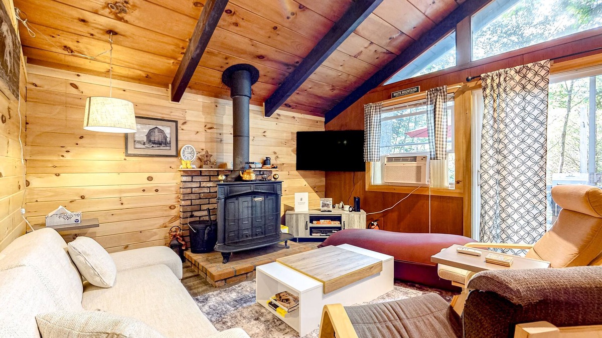 Center Conway House | Secluded, rustic, dog-friendly home with firepit, deck & woodstove