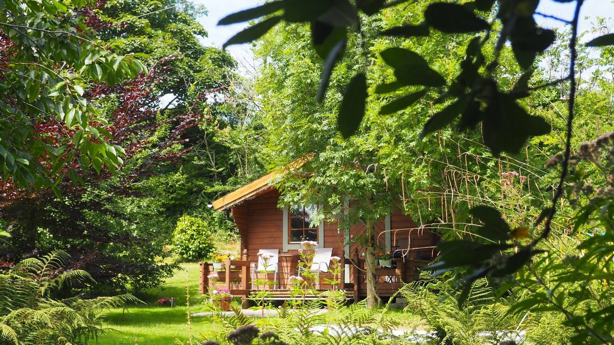 Truro Cottage | Secluded Swedish Lodge in Private Lakeside Gardens