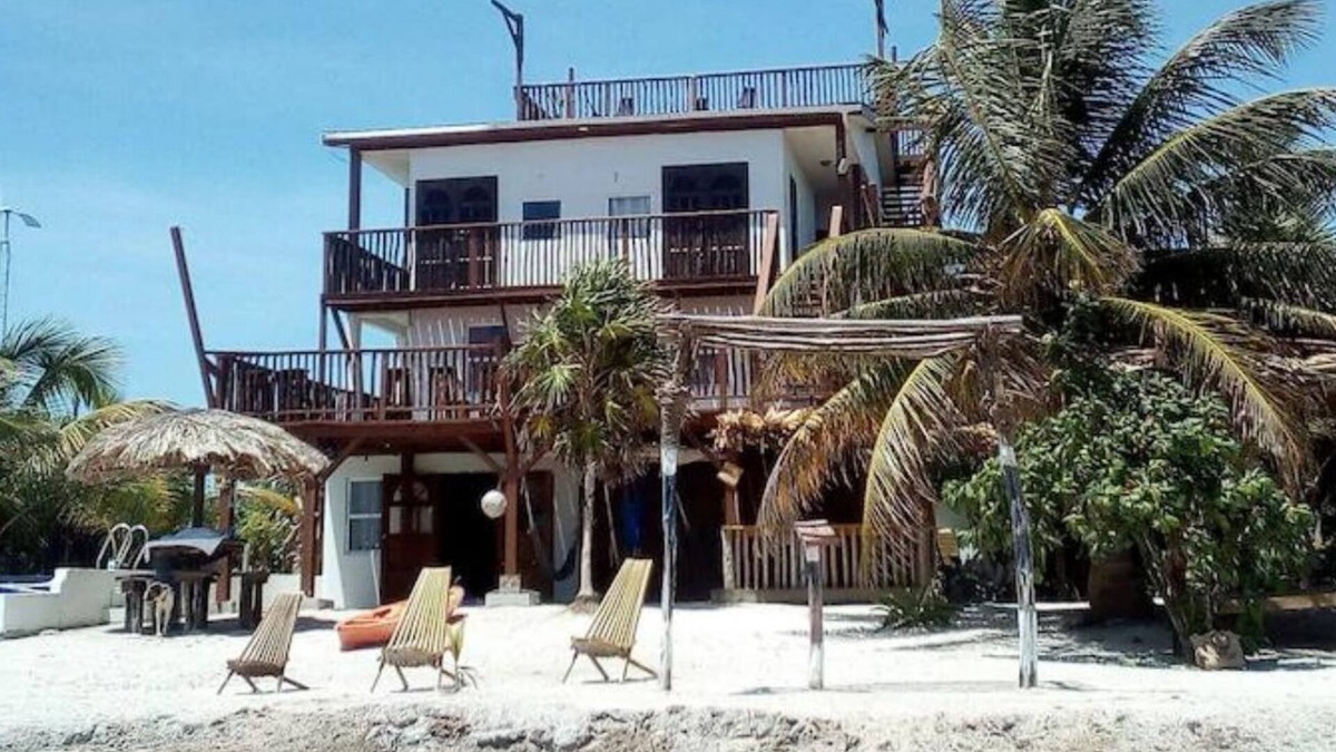 Caye Caulker House | Seculuded beachfront home, outdoor showers, rooftop deck, 360 island view
