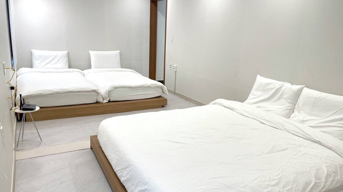 Jung-gu House | Serene building with WiFi in beautiful BusannThere is a large bed.