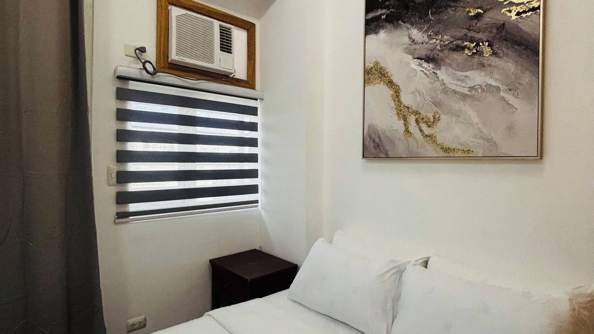 Iloilo Condo | Serene Getaway with Prime Emperador View