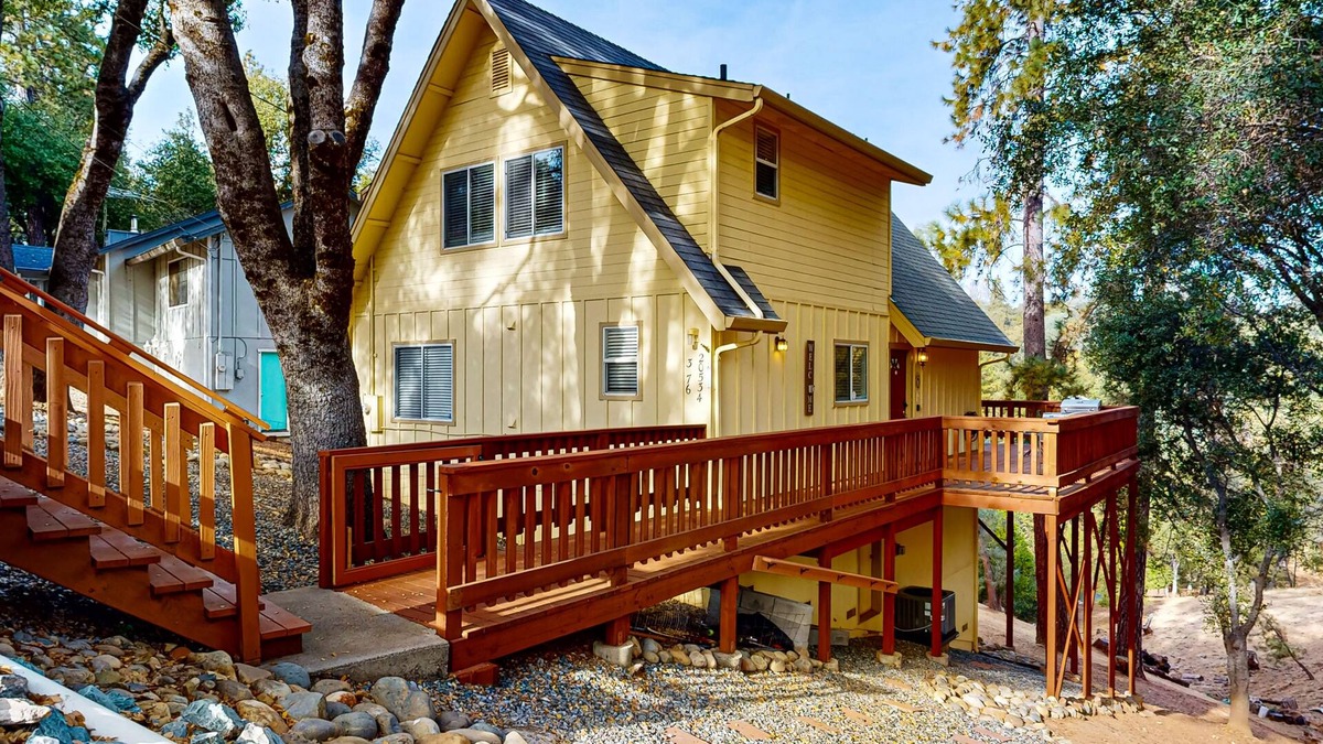 Groveland Cabin | Serene home with spacious deck, fireplace, loft, nearby amenities, dog friendly