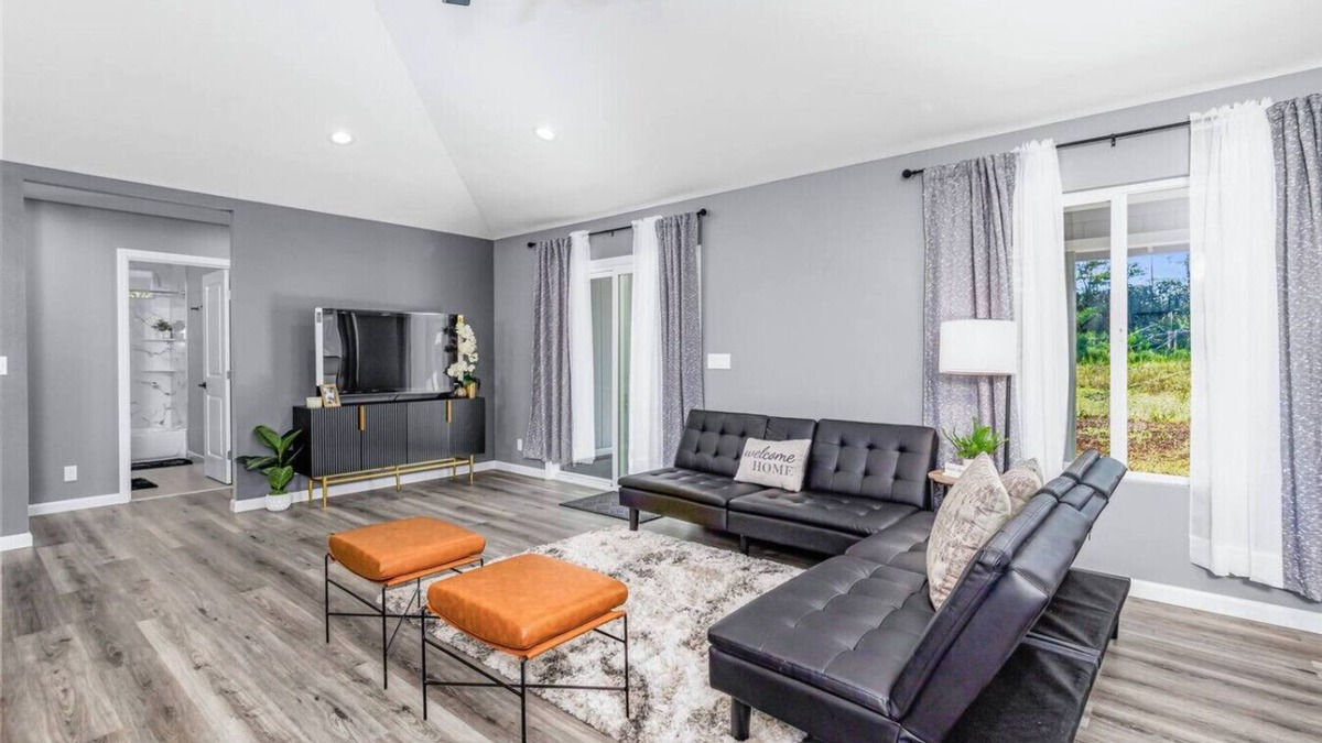 Keaau House | Serene Sky Blue Lounge: Unwind in Comfort & Style