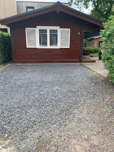 Beekbergen-Zuid House | Sfeervolle blokhut op de Veluwe op recreatiepark Topparken in Beekbergen met vrije tuin en eigen parkeerplaats