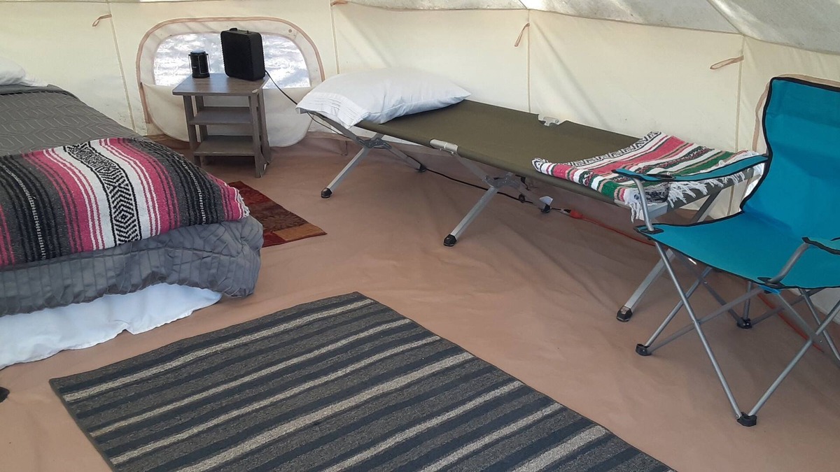 Spring Branch RV Rental | Shady Oaks Glamping Tent Queen Bed, 2 Cots, AC and Electricity