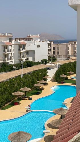 Ras Nasrani Apartment | Sharm Hills Luxury Pool View