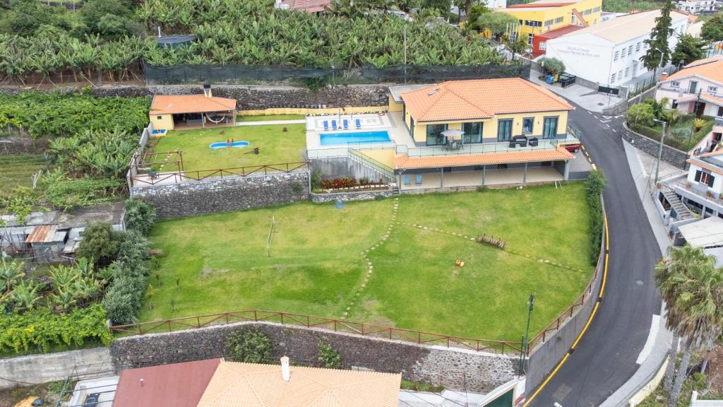 Arco da Calheta Villa | Shell House by GALMI