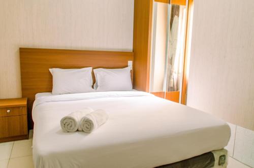 Panunggangan Utara Apartment | Simply and Cozy Pool View 2BR at Great Western Apartment By Travelio