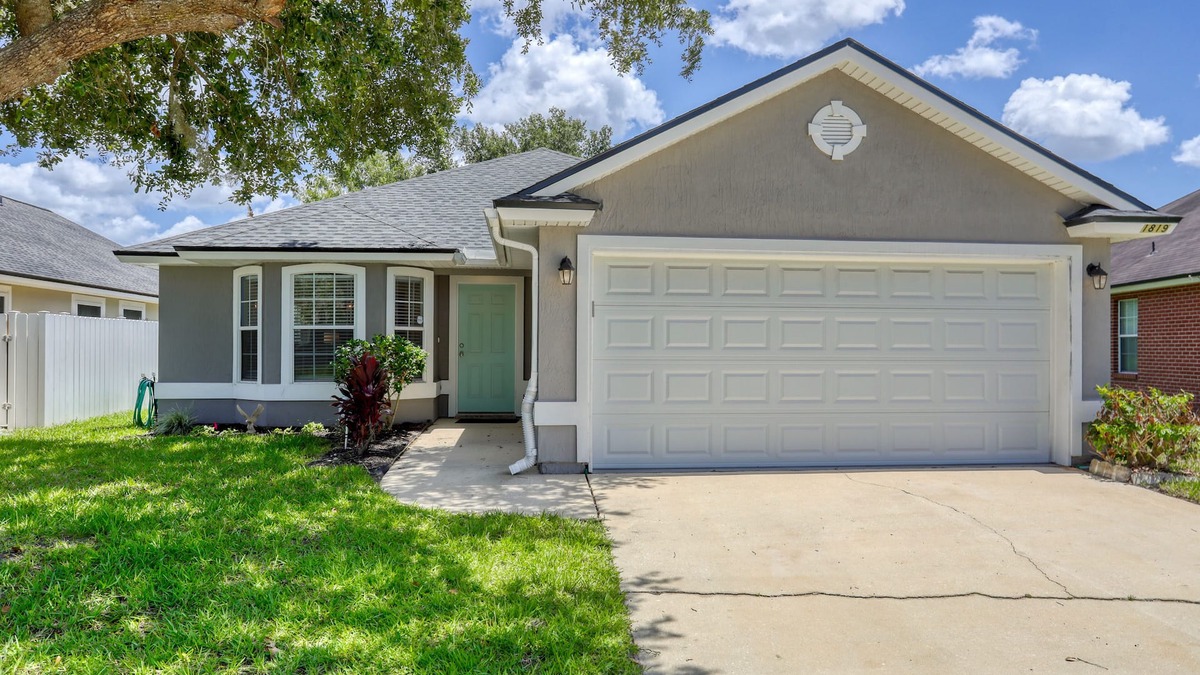 Sandalwood House | Single-story home with lagoon view, garden patio & easy drive to the beach