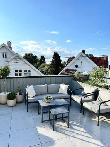Stavanger Apartment | Sjarmerende og sentralt beliggende leilighet med stor ballkong på Storhaug - Perfekt sommerleie!