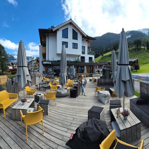 Hinterglemm Hostel | SKILL Mountain Lodge - Ski und Bike Hostel im Sommer mit JOKER CARD