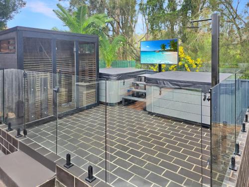 Malua Bay House | Skyes Beach House -Views, Spas, Sauna, Arcade Games