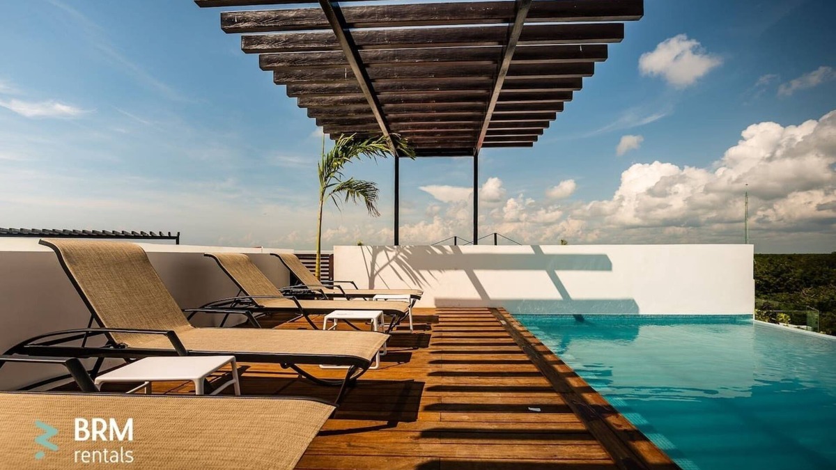Zama Condo | Sleeps 5. Rooftop infinity pool, 2 bed, 2.5 baths, 2nd floor
