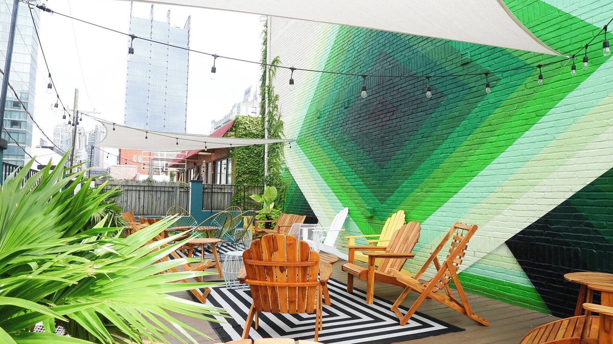 Rutledge Hill House | Sleeps 8 | 4 SoBro Suites Near Bars, Dining & Live Music – by AvantStay