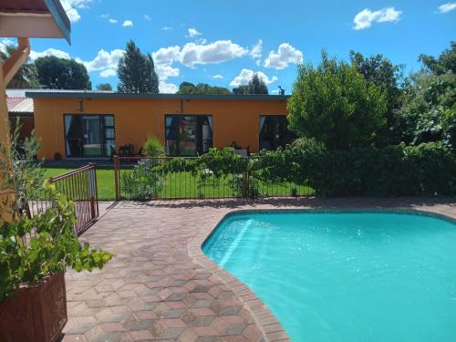 Universitas House | SONHOS dreams Self catering Garden Cottages