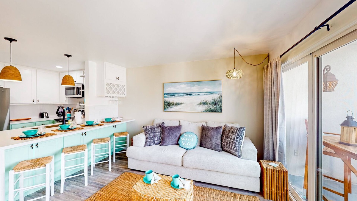 South Oceanside Condo | Sound view condo with modern interior, gas fireplace, balcony, & W/D access