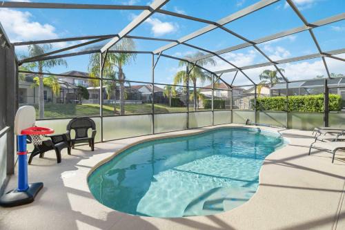 Lake Wilson Preserve House | Spacious 4 Bedroom Vacation Villa Near Disney perfect for Two Families