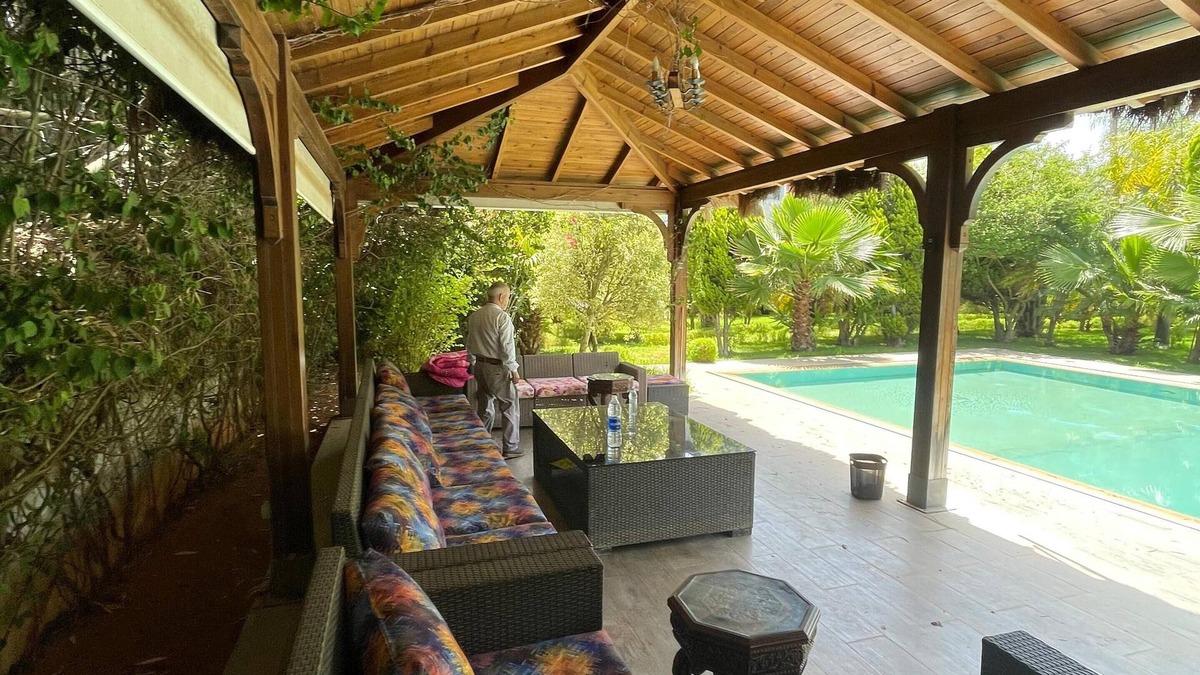 Oulad Slama Villa | Spacious 6-bedroom villa in delightful Kenitra with AC, fitness room, WiFi