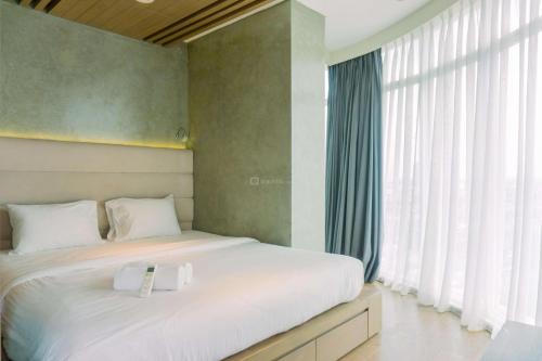 Cikokol Apartment | Spacious and Homey 2BR at Tree Park City Cikokol Apartment By Travelio