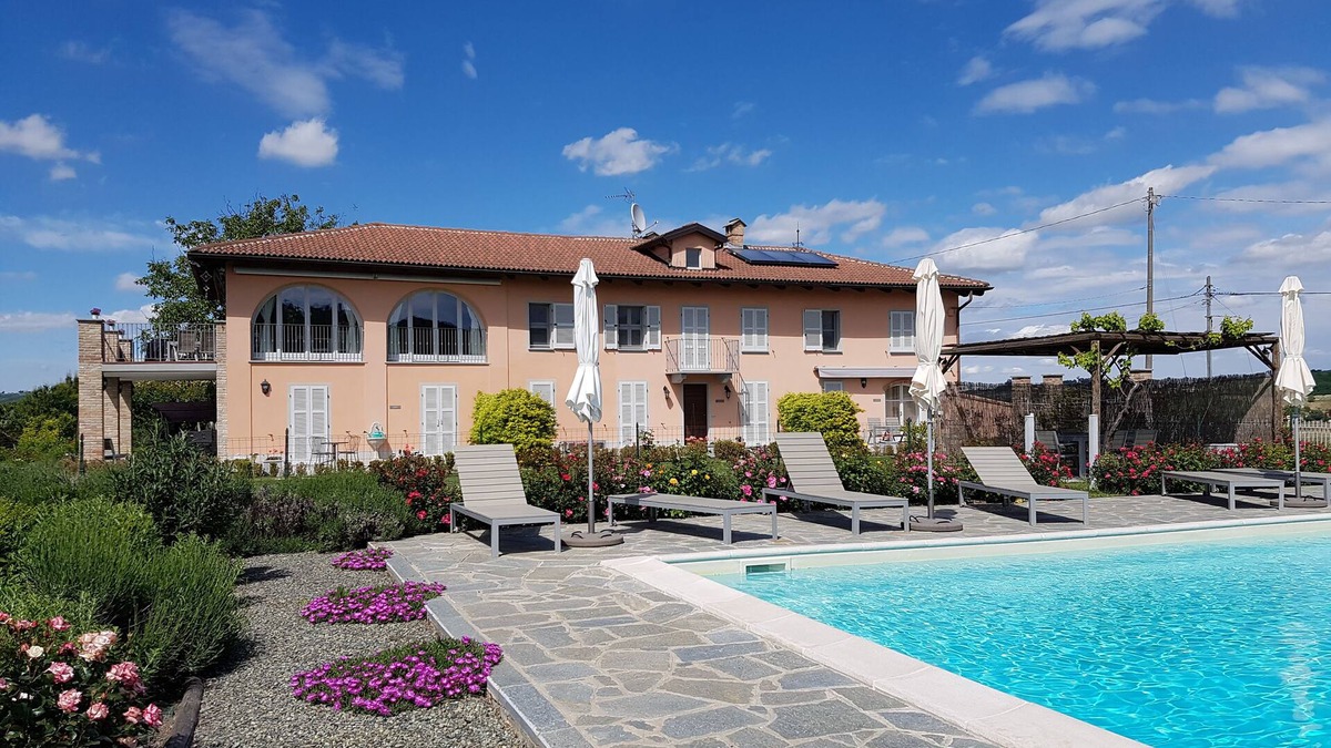 Castiglione Tinella Apartment | Spacious apartment in beautifully renovated property with shared pool and garden