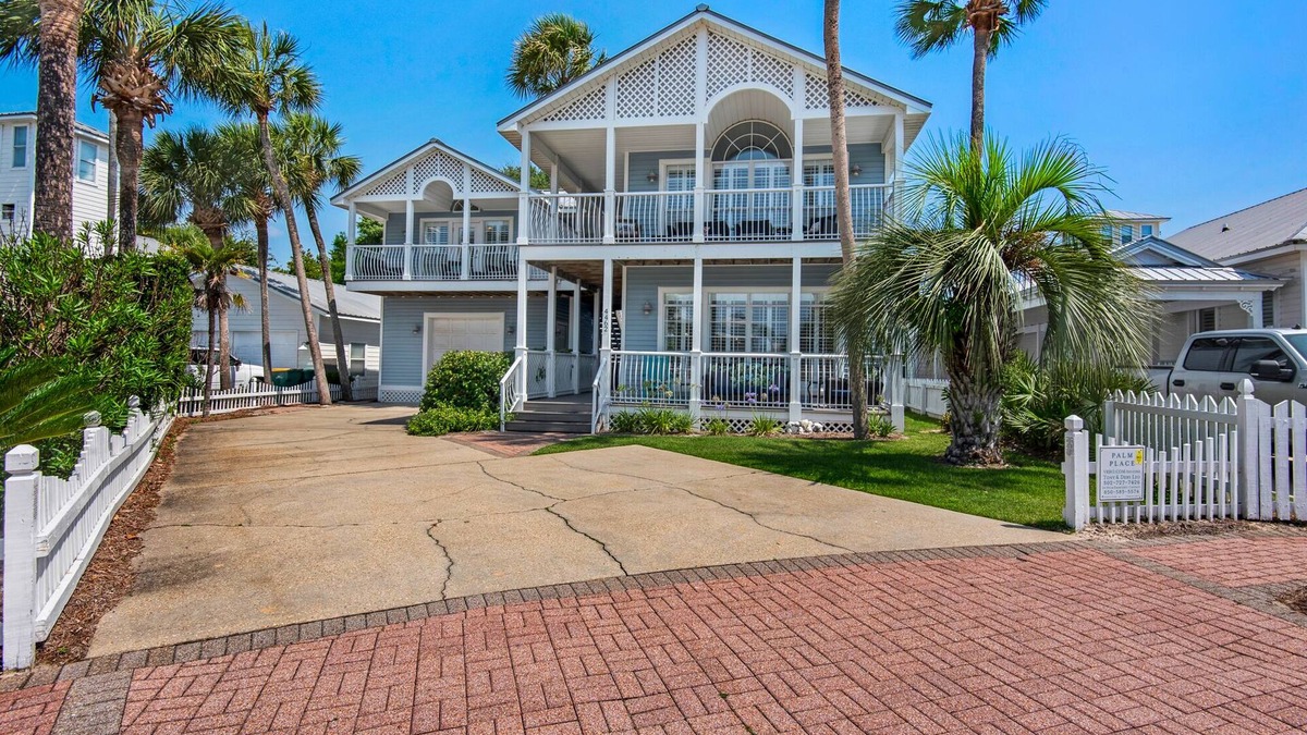 Crystal Shores House | Spacious beach house steps to the powdery white side and emerald water.