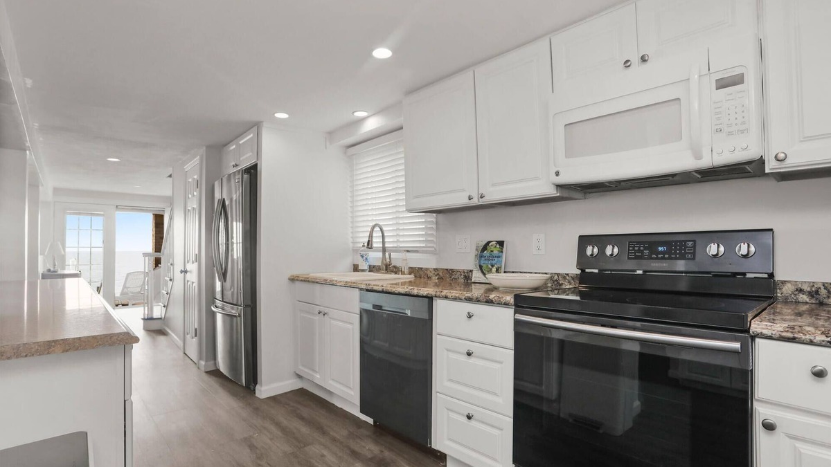Devon House | Spacious Beachfront home in vibrant Beach Community!