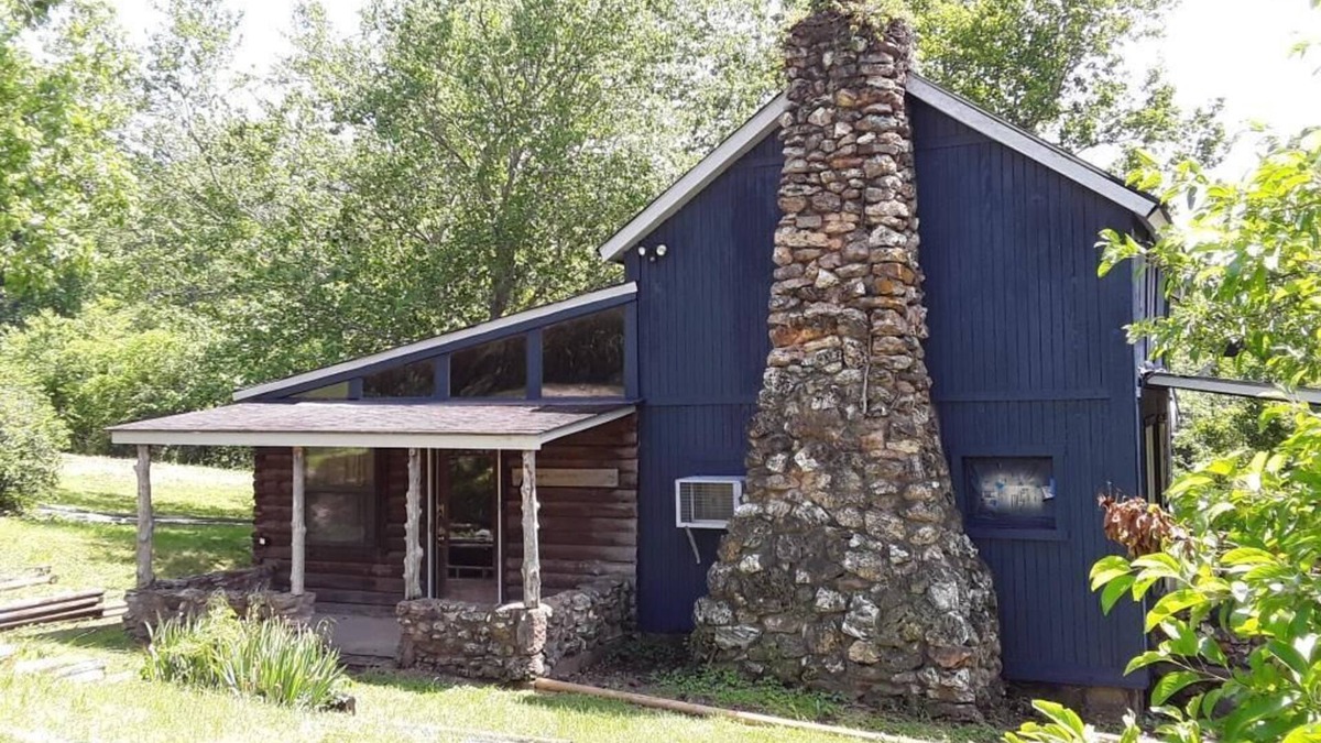 St. James House | Spacious but cozy farmstead lodge has stone fireplace and sleeping for 9 to 10