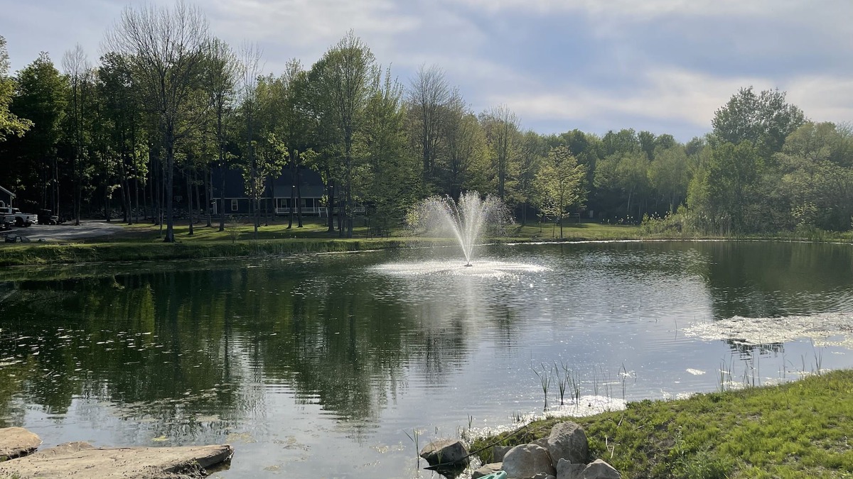 Town of Dickinson Center House | Spacious Cape Style house on 43 acres with pond