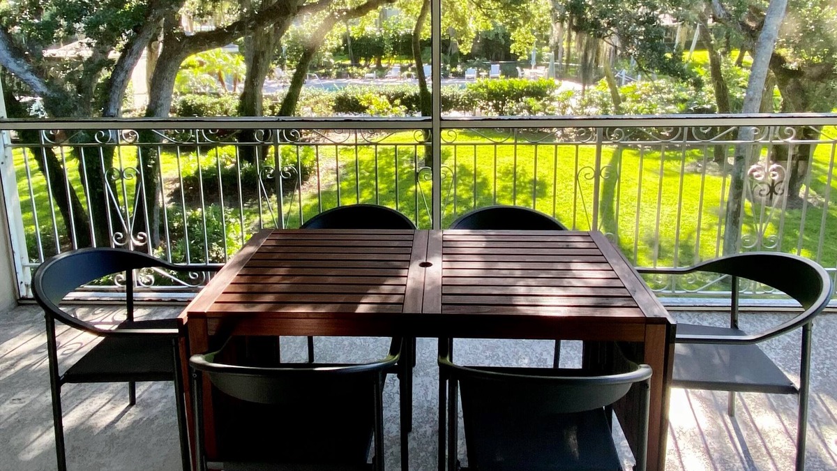 Indian River Shores Condo | Spacious condo with views of oak canopy, gardens & pool. 5-minute walk to beach.