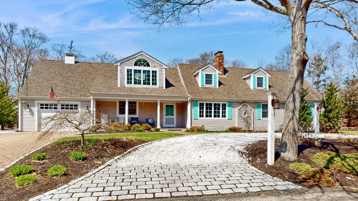West Yarmouth House | Spacious coastal retreat close to beach with modern kitchen, deck, AC, & sunroom