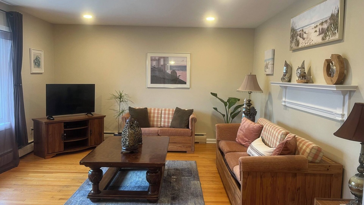 Belmar House | Spacious home with a view of the Shark River and a game room.