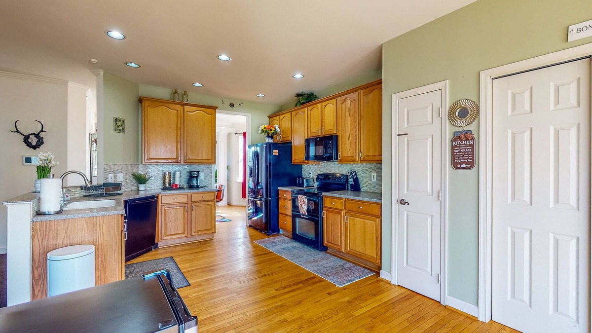 Sykesville House | Spacious home with enclosed yard, deck, children's items, full kitchen, & W/D