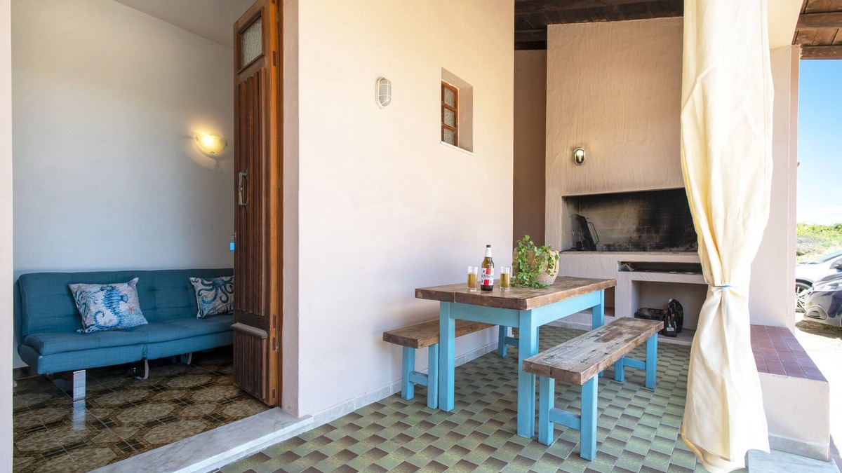 Paduledda House | Spacious House in Costa Rossa with Partial Sea View and Terrace