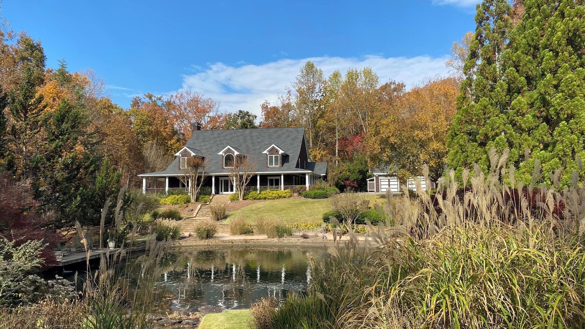Flowery Branch House | Spacious Lake Front Home with beautiful Gardens, Pond, Waterfall, Pool, & Dock