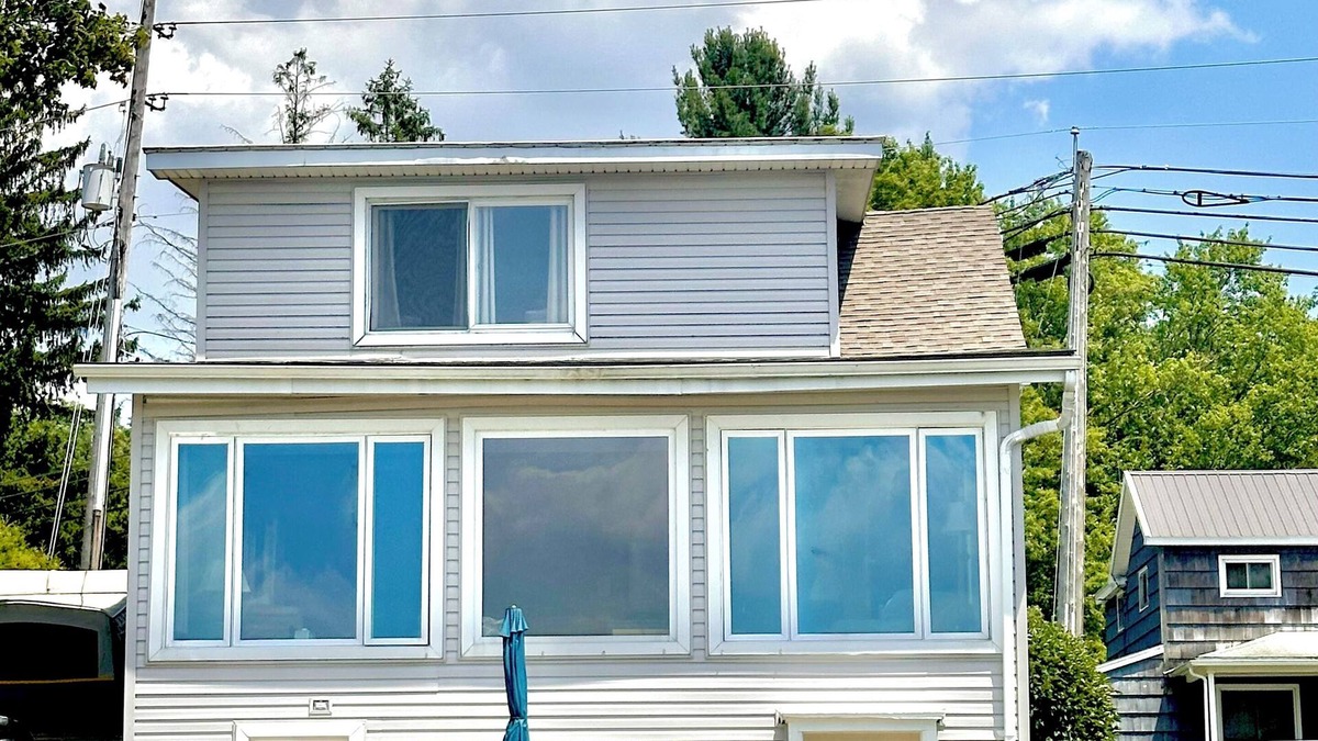 Conneaut Lakeshore House | Spacious lakefront home with private dock and a panoramic view of Conneaut Lake.
