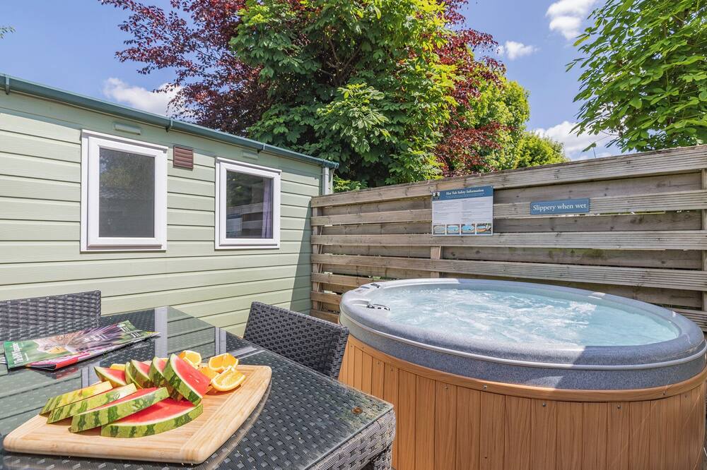 Longnor House | Spacious modern one-bedroom caravan exclusively for two adults with hot tub.