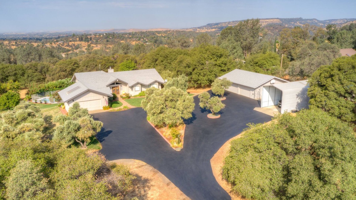 Oroville East House | Spacious residential home with pool, bar, and game room.