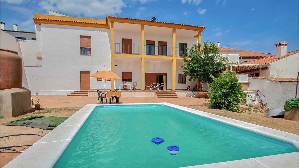 Villanueva del Rey House | Spacious vacation home with private outdoor pool.