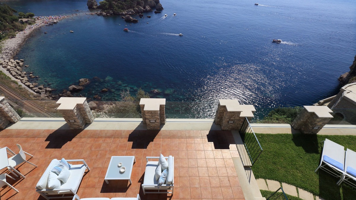 Mazzaro Apartment | Sparrowhawk Isolabella Suite. Suite with a view of Isolabella Bay